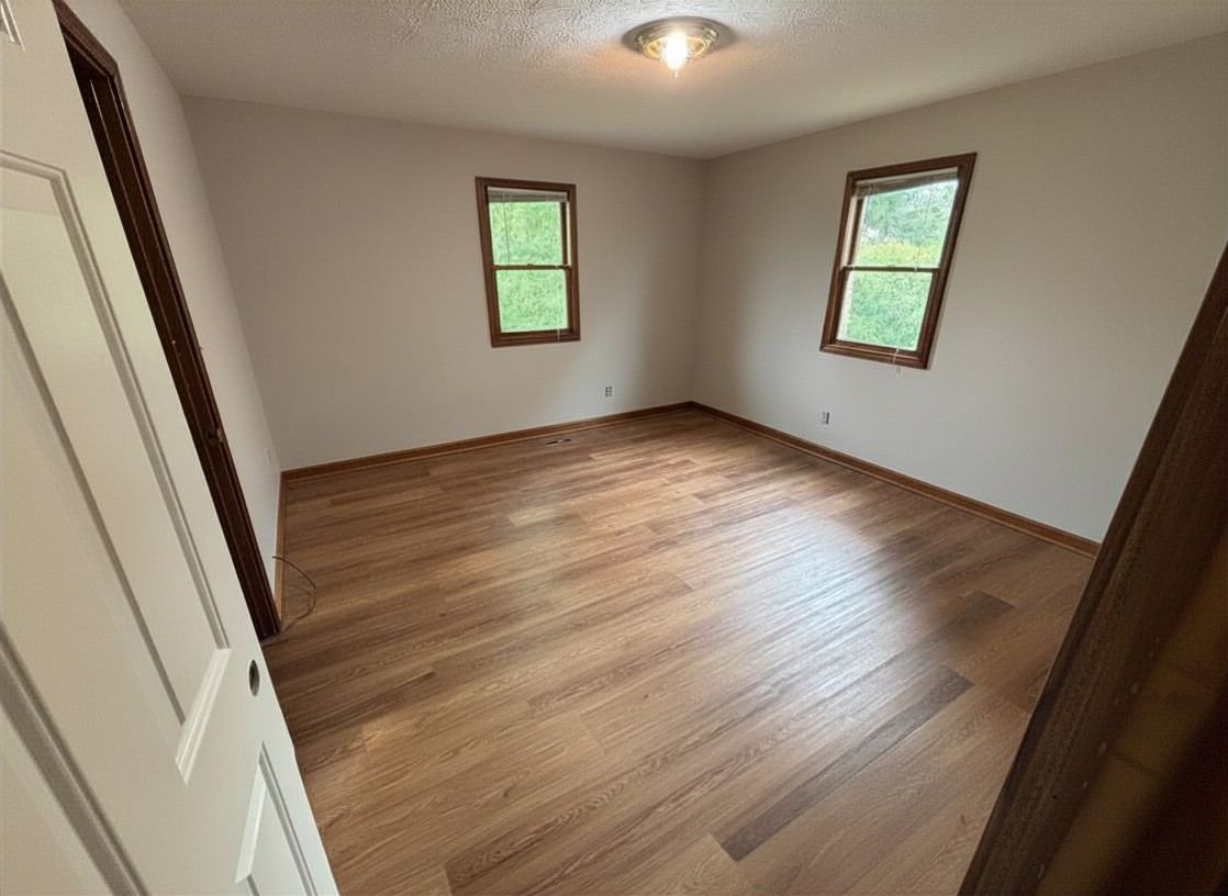 Warm wood look LVP flooring in a finished living space